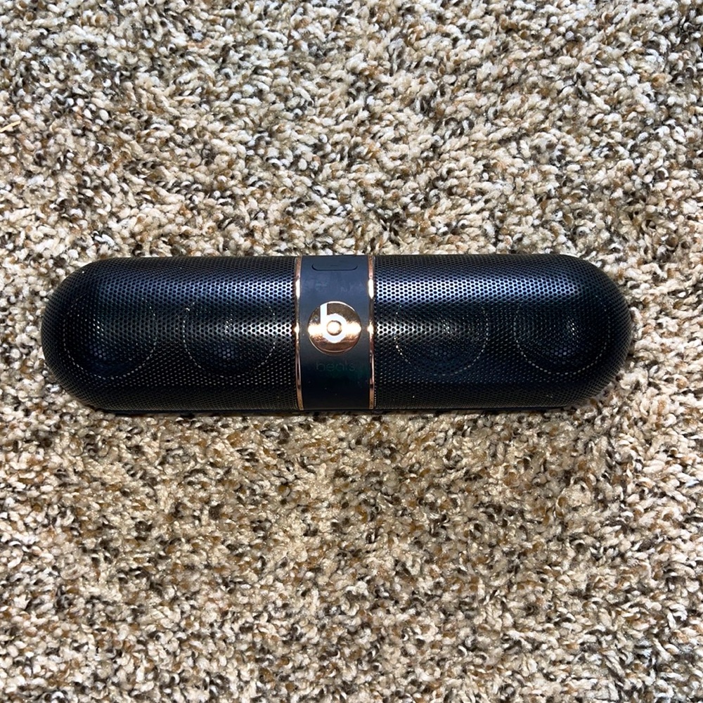 Beats by Dre black and rose gold pill speaker